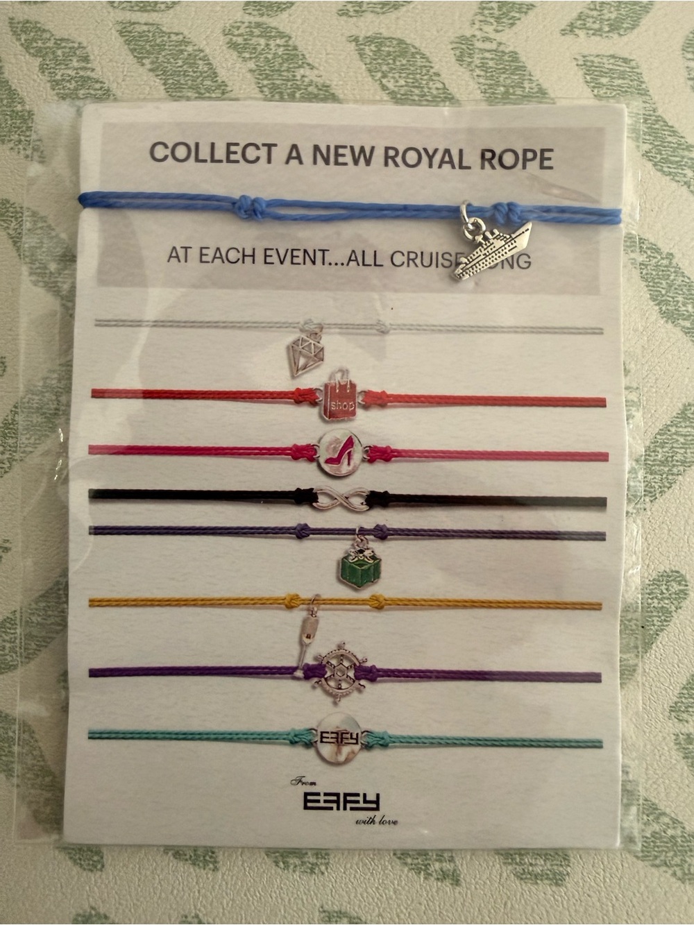 Silver Cruise Ship Charm Bracelet on Light Blue Braided Cord